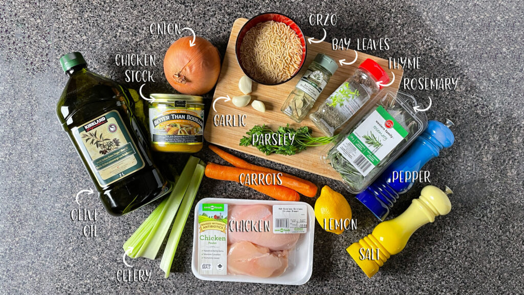 The ingredients for Lemon Chicken Orzo Soup are arranged on a counter.