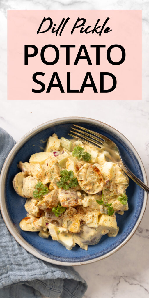 An image for Pinterest: A bowl contains potato salad, and a fork. A blue napkin is next to the bowl. 2 boiled eggs and 2 potatoes are next to the bowl. Text on the image reads, "Dill Pickle Potato Salad".