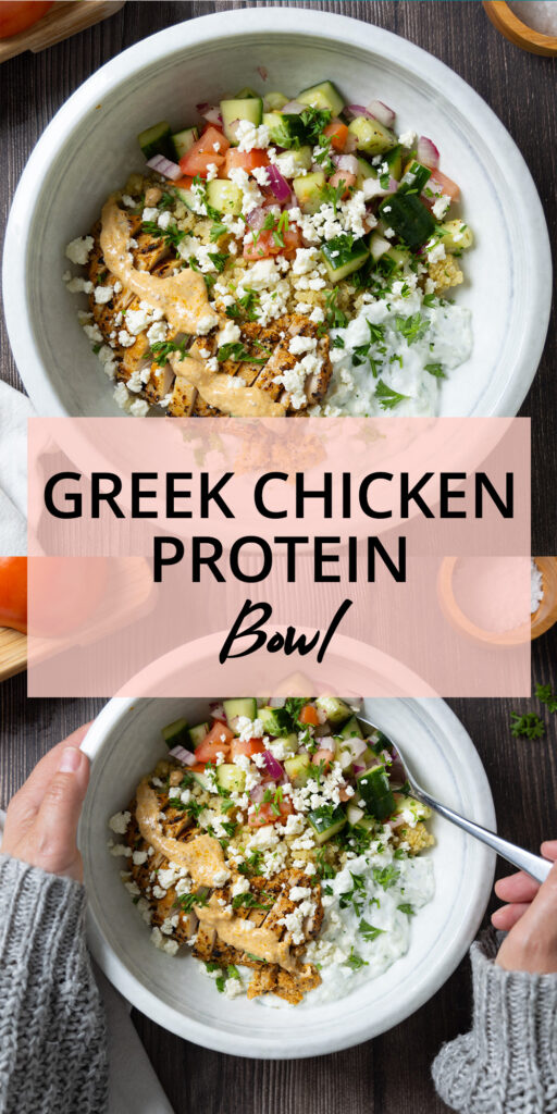 An image for Pinterest. A Greek Chicken Power Bowl, on a wooden table, on the table is a small cutting board with a tomato, a wooden bowl of salt, a white napkin, a fork, a wooden spoon, some lemon wedges, a red onion, and some parsley.