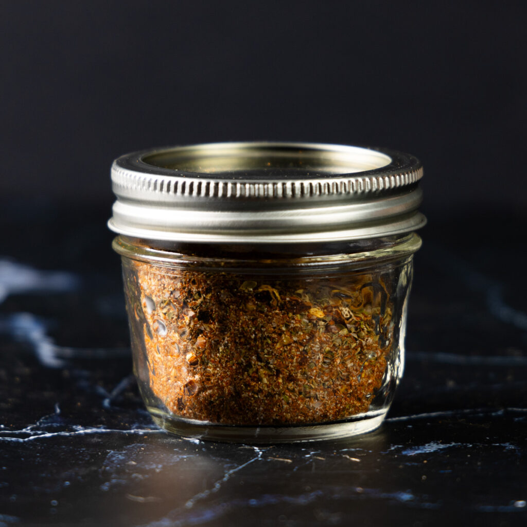 A jar of homemade Cajun Seasoning.