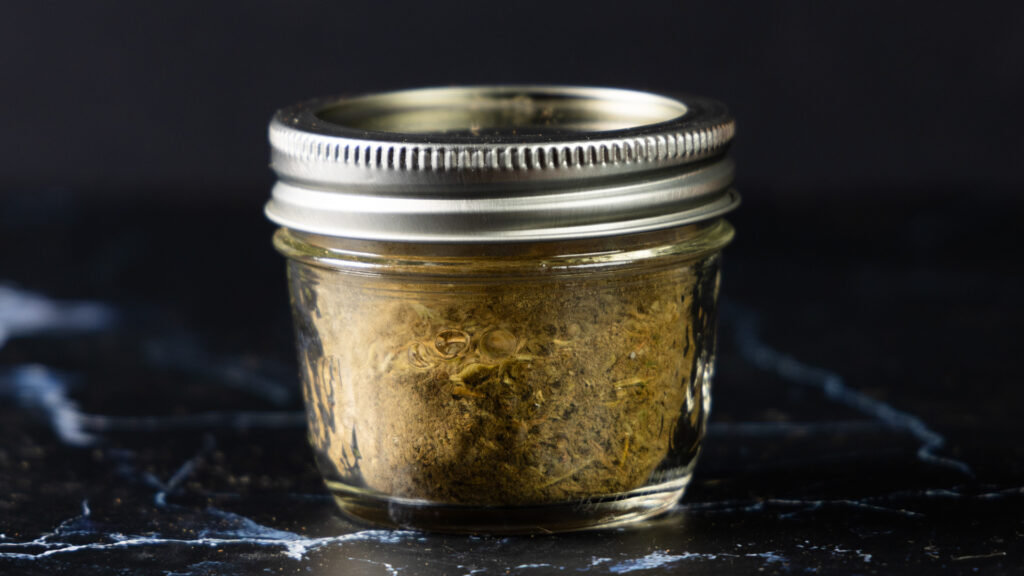 A jar of homemade Poultry Seasoning.