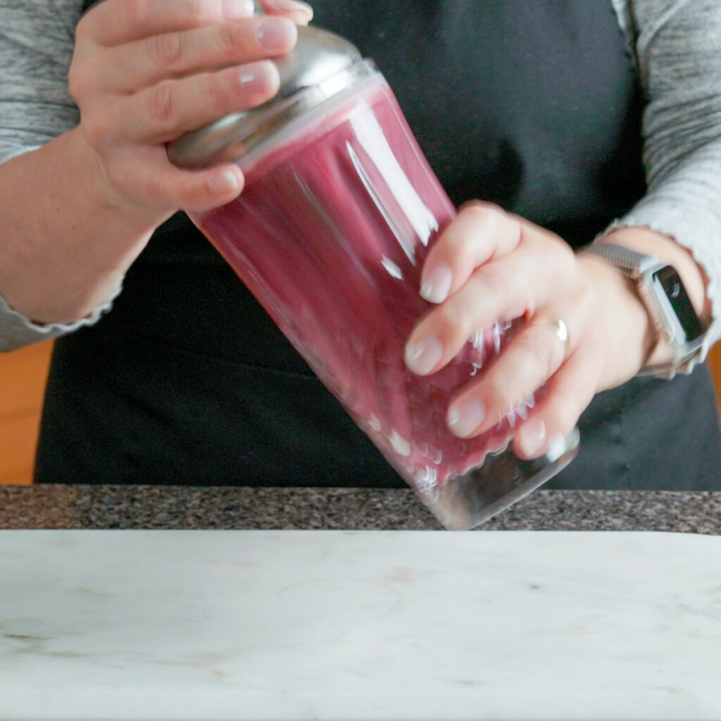 How to make a Blackberry Basil Sour: Shake the cocktail until light, foamy, and well chilled.