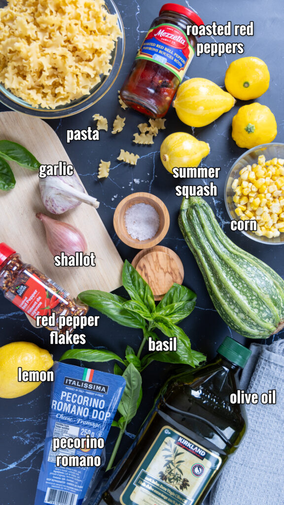 A photo of the ingredients for summer squash pasta are displayed on a counter.