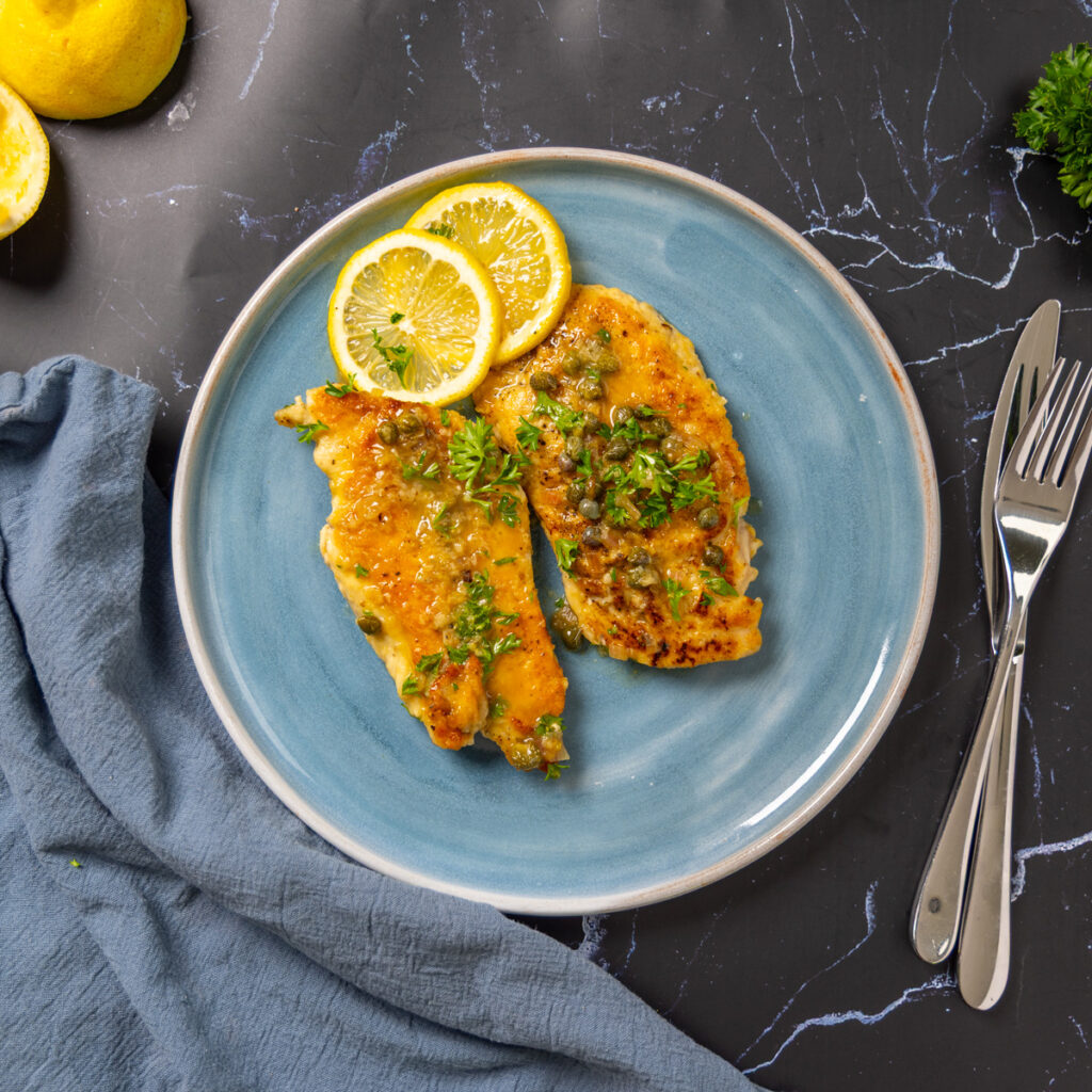 Chicken Piccata on a plate.