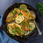 Chicken Piccata in a cast iron skillet.
