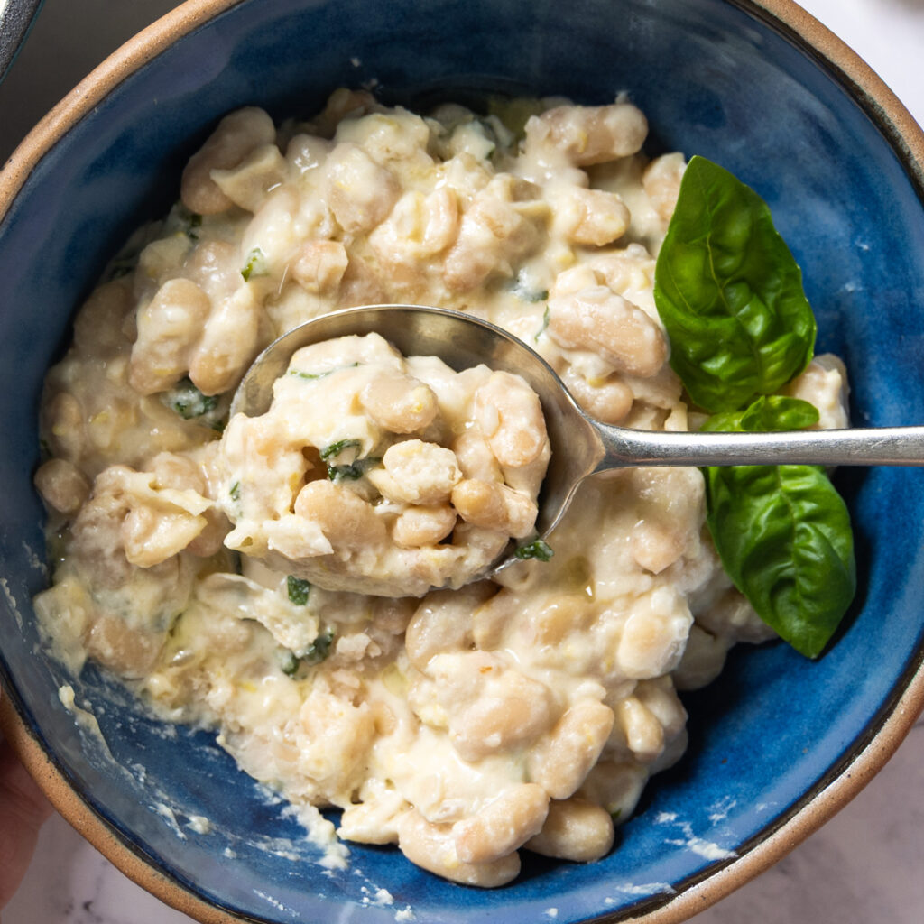 Creamy lemon parmesan beans in a bowl
